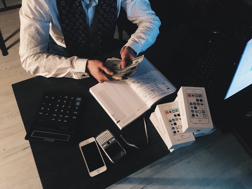 Coins and currency representing multiple passive income streams in India